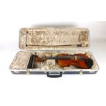 A near full size violin, two piece back, applied paper label stamped Straduarius, length of back