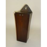 An oak candle box, probably late 18th Century, of tapering square section with sliding front and