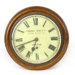 An oak framed circular wall clock, 10 inch painted dial inscribed 'Camerer.Cuss and Co, 56E Oxford