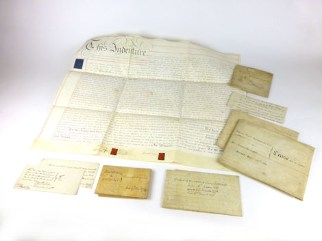A small collection of vellum indentures and other paper work ,