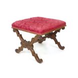 A French walnut X framed stool, 19th Century, with square cushioned top. h. 43 cm, w. 52 cm