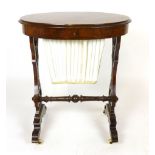 A Victorian Walnut oval work table, with a single drawer and silk lined well drawer, height 67cm