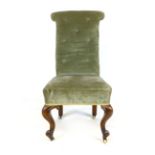 A Victorian walnut framed nursing chair with button back and scrolling legs CONDITION REPORT: Back