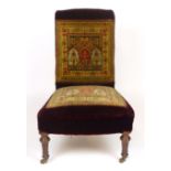 A Victorian nursing chair, with maroon velour and tapestry upholstery
#VAT will be added to the