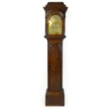 A walnut long case clock, mid 18th century and later, the brass 12 inch dial inscribed 'John