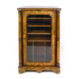 A Victorian walnut and inlaid music cabinet, the glazed door flanked by tuned columns, height 98cm