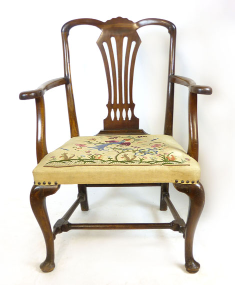 A George ll style mahogany elbow chair with pierced splat, tapestry upholstered seat, gentle out