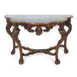 A Spanish walnut console table, 19th century, with painted leather top, pierced gallery and cabriole