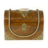 A Victorian walnut stationery box of domed form, the cover inset with a porcelain plaque, the