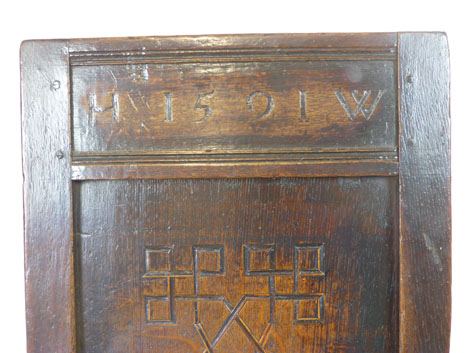 An oak joined elbow chair, possibly late 16th Century, the back carved with the date 1591, flanked - Image 3 of 11