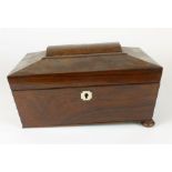 A Victorian rosewood work box of sarcophagus form with fitted interior, with Mother of Pearl