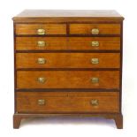 A 19th Century oak and mahogany cross banded chest of two short and four graduated long drawers with