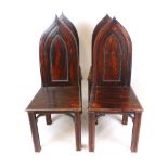 A set of four Gothic style hall chairs, with ogee backs, painted decoration (4)
#VAT will be added