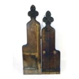 A pair of Victorian oak pew ends, trefoil finials, well carved with fruiting vines above Gothic