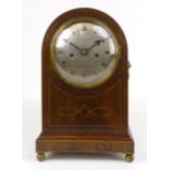 A Mappin & Webb mahogany and inlaid mantle clock, 14.6 cm  silvered dial, brass fish scale