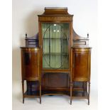 An Edwardian Sheraton style mahogany display cabinet with marquetry floral and string inlay, the