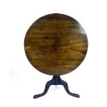 A George III mahogany circular tilt top occasional table on a tripod base, w. 91 cm CONDITION