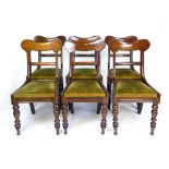 A set of six Victorian mahogany dining chairs, shaped top rail, drop in seats and  turned front legs