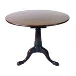 A mid Georgian mahogany tilt top tripod table with a bird cage,