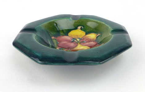 A William Moorcroft ashtray of octagonal form decorated in the Freesia pattern, d.