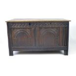 18th century and later oak coffer, the carved top rail above two arcaded panels, h. 66 cm, d.