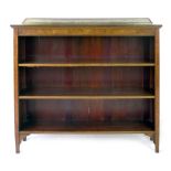 An Edwardian mahogany open bookcase by Sholbred,