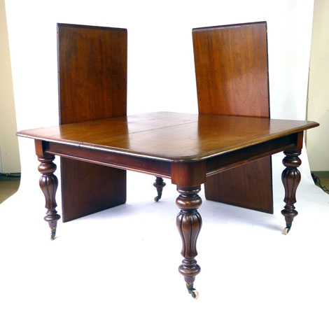 A Victorian mahogany telescopic extending dining table, with two fitted leaves, - Image 2 of 2