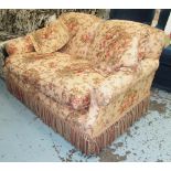 SOFA, two seater, in rose linen fabric with bullion fringe, 162cm W x 90cm D x 82cm H.