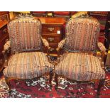 FAUTEUILS, a pair, late 19th century French rosewood in Kilim carpet upholstery, 66cm W. (2)