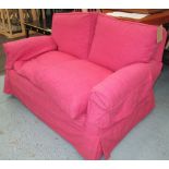 SOFA, in a pink Manuel Canovas fabric, 142cm x 86cm H x 84cm.