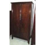 CHINESE CABINET, elm with a pair of panelled cupboard doors enclosing three drawers, 104cm W x 199cm