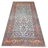 ANTIQUE BIDJAR RUNNER, 303cm X 140cm, all over vine and rosette design on ivory field.