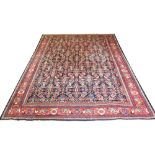 ANTIQUE SULTANABAD CARPET, 400cm x 309cm, repeat Herati design on sapphire field within terracotta