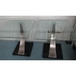 SIDE TABLES, a pair, with glass top and swept metal supports, 56cm x 61cm x 61cm H. (2)