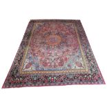 ANTIQUE DOROSH CARPET, 335cm x 240cm, of amber and ebony central medallion on cerise field within