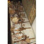 WALL LIGHTS, a set of six, brass, twin branch, with ribbon - tied surmounts and shades, 50cm H. (