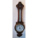 ANEROID BAROMETER, late Victorian, carved oak, 87cm H x 27cm W.