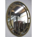 WALL MIRROR, of oval form with gilt fram