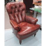 ARMCHAIR, in tanned leather button backe