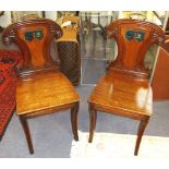 HALL CHAIRS, a pair, Regency mahogany wi