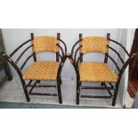 CHRISTIAN LIAIGRE CHESTNUT ARMCHAIRS, a