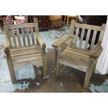 GARDEN ARMCHAIRS, two similar, weathered