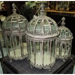 STORM LANTERNS, two pairs, circular, wit