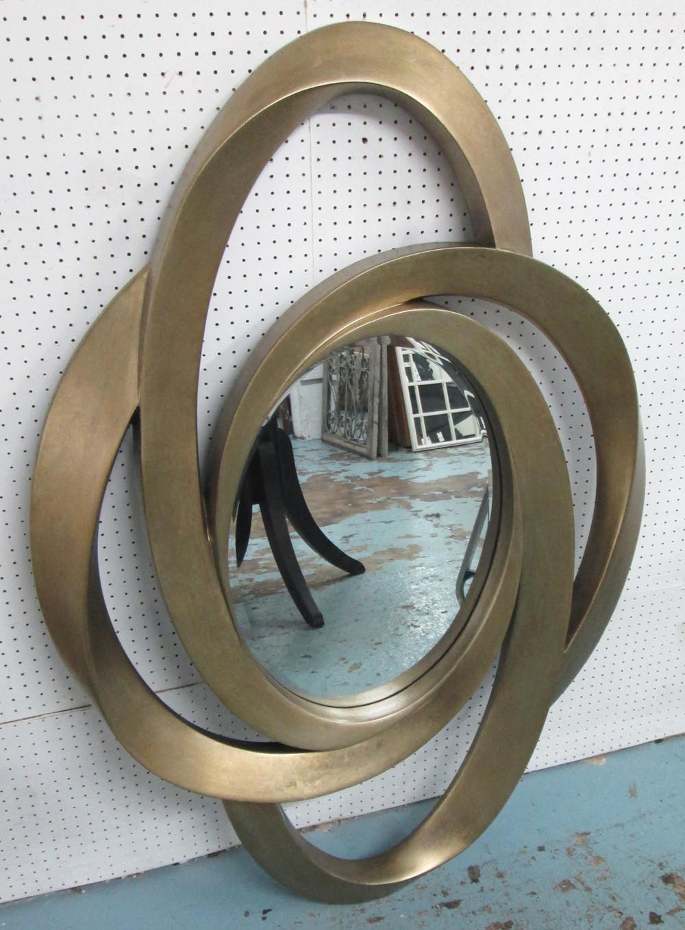 WALL MIRROR, curved form with bevelled p