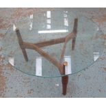 LOW TABLE, the circular glass top on a w