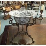CENTRE PIECE BOWL, pierced rim, with chinoiserie decoration, ornately mounted with three candle