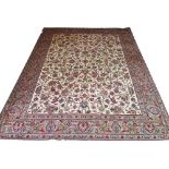 FINE TABRIZ, 387cm x 300cm, palmettes and vines on an ivory field within bands and border.