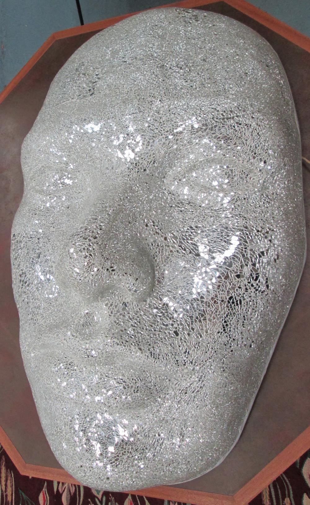 WALL ORNAMENT, of a face, in white mirrored mozaic finish, 101cm H.