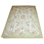 AUBUSSON STYLE NEEDLEPOINT, 270cm x 180cm, all over floral design on an ivory field.