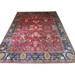 ANTIQUE VERAMIN CARPET, 393cm x 298cm, all over floral design on a claret field within a
